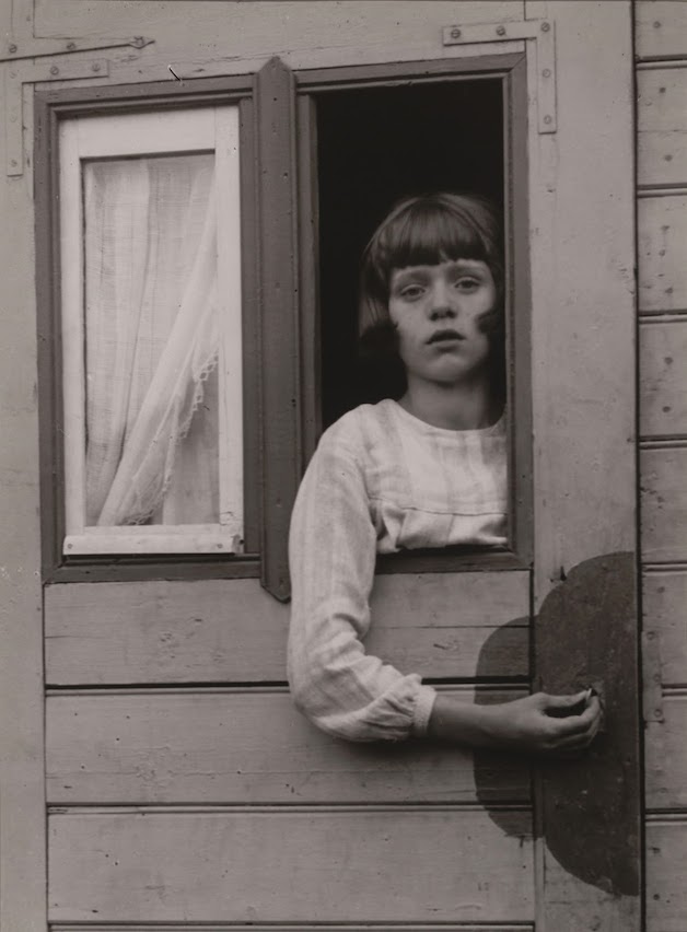 August-Sander-Young-Girl-in-Circus-Caravan_1929